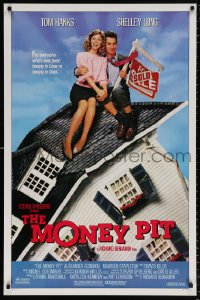 8k811 MONEY PIT 1sh 1986 Steven Spielberg, Tom Hanks & Shelley Long are deeply in love & debt!