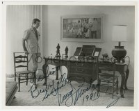 8p471 GEORGE MONTGOMERY signed 8.25x10 publicity photo 1981 standing in a room at his home!