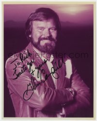 8p790 GLEN CAMPBELL signed color 8x10 REPRO still 1980s smiling in leather jacket late in career!