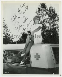 8p643 SUE ANE LANGDON signed 8x10 still 1966 as a sexy nurse sitting on ambulance in Hang On!