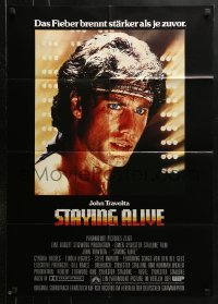 8r496 STAYING ALIVE German 1983 Stallone, John Travolta in Saturday Night Fever sequel!