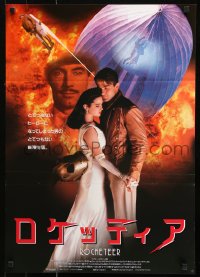 9b601 ROCKETEER Japanese 1991 Disney, different c/u of Bill Campbell & Jennifer Connelly embracing
