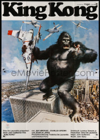 9f054 KING KONG German 2p 1976 different John Berkey art of BIG Ape on the Twin Towers!