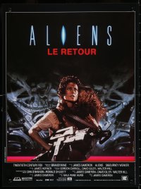 9z773 ALIENS French 15x21 1986 James Cameron, close up of Sigourney Weaver carrying Carrie Henn!