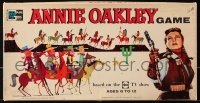 1h338 ANNIE OAKLEY pink title style board game 1957 cowgirl Gail Davis is forced to fight!