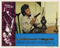 1k235 BEGUILED LC #1 1971 c/u of Clint Eastwood sitting at table pointing gun, Don Siegel!