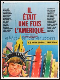 2k427 AMERICA AT THE MOVIES French 1p 1977 Mercier art of kid dressed as Lady Liberty in NY!