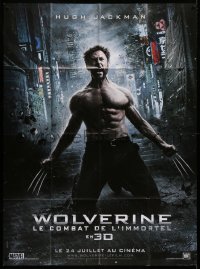 2z1229 WOLVERINE teaser French 1p 2013 Hugh Jackman as Logan kneeling with his claws extended!