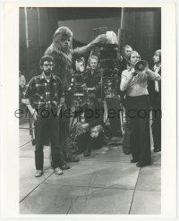 3f1031 GEORGE LUCAS signed 8x10 REPRO still 1980s candid on the Star Wars set with Chewbacca & crew!