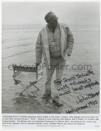 3f0639 JOHN STURGES signed 7.5x9.75 still 1974 pulling his chair out of the ocean after McQ filming!