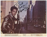 3f0721 RICHARD ROUNDTREE signed color 8x10 still 1971 wearing leather jacket on city street in Shaft!