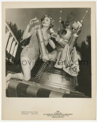 3r0259 GOG 8x10.25 still 1954 funky robot gives cigarettes & matches to Doris Dowling in swimsuit!