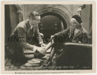 3r0635 WORKING GIRLS 8x10 still 1931 Paul Lukas gives slippers to Dorothy Hall while her shoes dry!