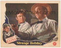 3r1397 STRANGE HOLIDAY LC #8 1946 close up of Claude Rains staring at Milton Kibbee!