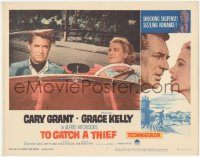 3r1447 TO CATCH A THIEF LC #7 R1963 Grace Kelly driving convertible watches Cary Grant, Hitchcock