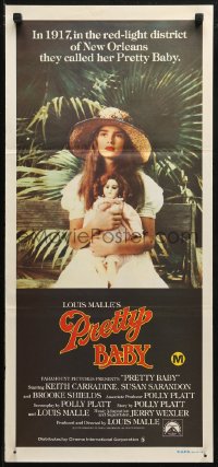 3x0493 PRETTY BABY Aust daybill 1978 directed by Louis Malle, Brooke Shields sitting with doll!