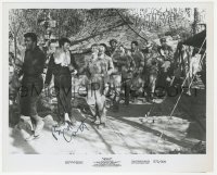 3y0252 BUD CORT signed 8x10 still R1973 great image marching in line with co-stars in MASH!