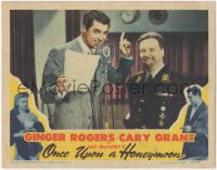 3z1068 ONCE UPON A HONEYMOON LC 1942 close up of Cary Grant talking into microphone, Leo McCarey