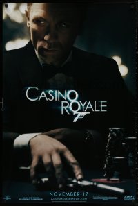 4a0784 CASINO ROYALE teaser 1sh 2006 Craig as James Bond sitting at poker table w/gun!