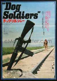 4f1149 WHO'LL STOP THE RAIN Japanese 1978 cool image of assault rifle buried on train tracks!