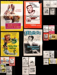 4h0999 LOT OF 25 UNCUT PRESSBOOKS 1950s-1970s advertising for a variety of different movies!
