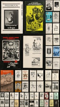 4x0383 LOT OF 53 UNCUT PRESSBOOKS 1970s-1980s advertising a variety of different movies!