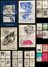 4x0392 LOT OF 28 UNCUT PRESSBOOKS 1960s-1970s advertising a variety of different movies!