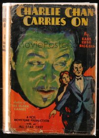 5c0138 CHARLIE CHAN CARRIES ON hardcover book 1931 Earl Derr Biggers' novel w/scenes from the movie!