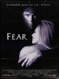 5c1167 FEAR French 1p 1998 super close up of creepy Mark Wahlberg holding Reese Witherspoon!