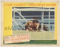 5k0878 AFFAIR TO REMEMBER LC #6 1957 Cary Grant kissing Deborah Kerr on stairs, Leo McCarey classic!