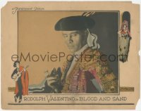 5s0202 BLOOD & SAND LC 1922 super close up of matador Rudolph Valentino smoking & looking cool!