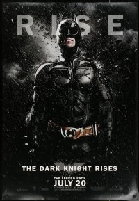 6a0365 DARK KNIGHT RISES DS bus stop 2012 image of Christian Bale in title role as Batman in rain!