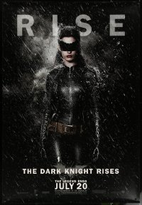 6a0364 DARK KNIGHT RISES DS bus stop 2012 great image of Anne Hathaway as Catwoman/Selina Kyle!