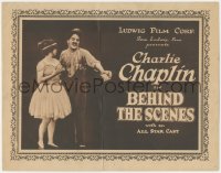6c0012 BEHIND THE SCREEN TC R1910s Charlie Chaplin laughing with Edna Purviance