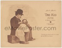 7a0468 KID LC 1921 Charlie Chaplin holding baby with enough yells to raise the roof, ultra rare!