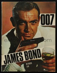 9g1189 007 JAMES BOND IN FOCUS English softcover book 1964 images from Sean Connery's spy movies!