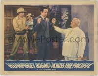 1b1925 ACROSS THE PACIFIC LC 1942 Humphrey Bogart held at gunpoint as Sydney Greenstreet grabs him!