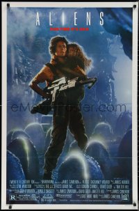 2p0665 ALIENS 1sh 1986 James Cameron sci-fi sequel, Sigourney Weaver as Ripley carrying Carrie Henn!