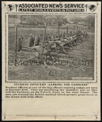 2r0017 ASSOCIATED NEWS SERVICE newspaper insert 1917 officers 'jabbing the Germans' with bayonets!