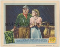 3y0569 AFRICAN QUEEN LC #3 1952 Humphrey Bogart & Katharine Hepburn on boat drenched in the rain!
