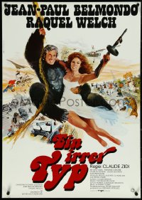 5k0277 ANIMAL German 1977 Jean-Paul Belmondo and sexy Raquel Welch swinging on rope by Yves Thos!