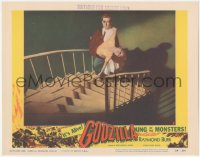 6f0466 GODZILLA LC #5 1956 rubbery monster classic, c/u of man w/ eyepatch carrying woman up stairs!