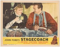 6j0599 STAGECOACH LC #7 R1948 great c/u of John Wayne eating & smiling at Claire Trevor, ultra rare!