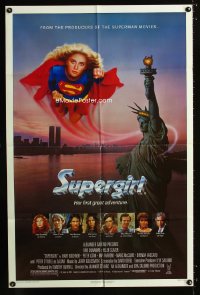 0768FF SUPERGIRL 1sh '84 super Helen Slater in costume flying over Statue of Liberty!