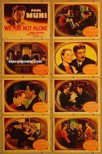a191 WE ARE NOT ALONE 8 movie lobby cards '39 Paul Muni, Jane Bryan