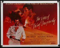 d728 YEAR OF LIVING DANGEROUSLY half-sheet movie poster '83 Mel Gibson
