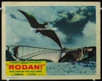 h443 RODAN movie lobby card #3 '56 he's flying over the giant bridge!