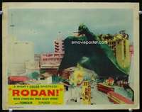 h446 RODAN movie lobby card #6 '56 he's looming over wrecked city!