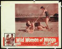 w842 WILD WOMEN OF WONGO movie lobby card '58 wacky cave babes fighting on beach!