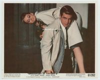 d053 BREAKFAST AT TIFFANY'S color 8x10 '61 George Peppard carries Audrey Hepburn on his shoulder!